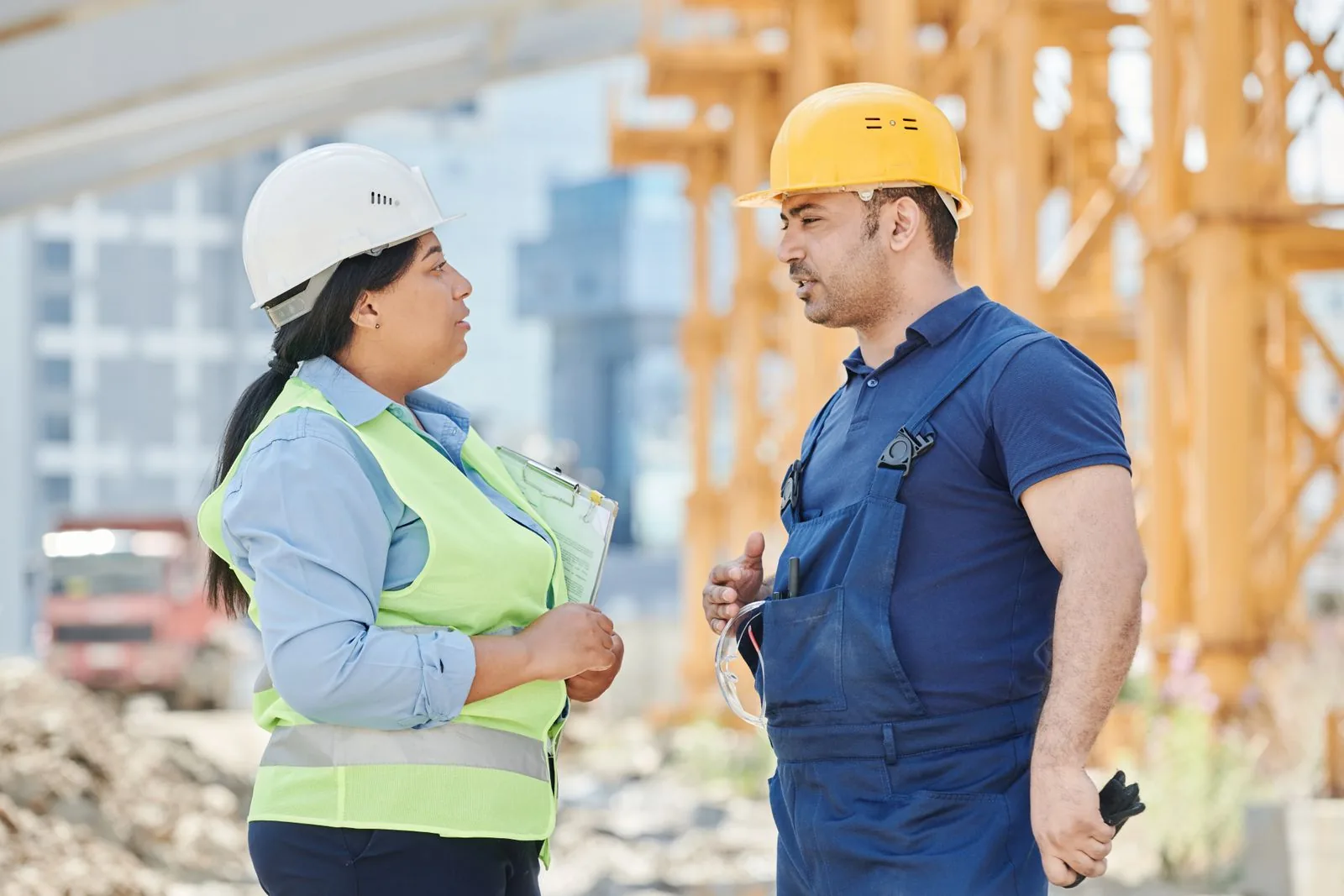 Engineers discussing work on a construction site